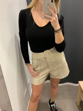 beige stretch shorts with belt