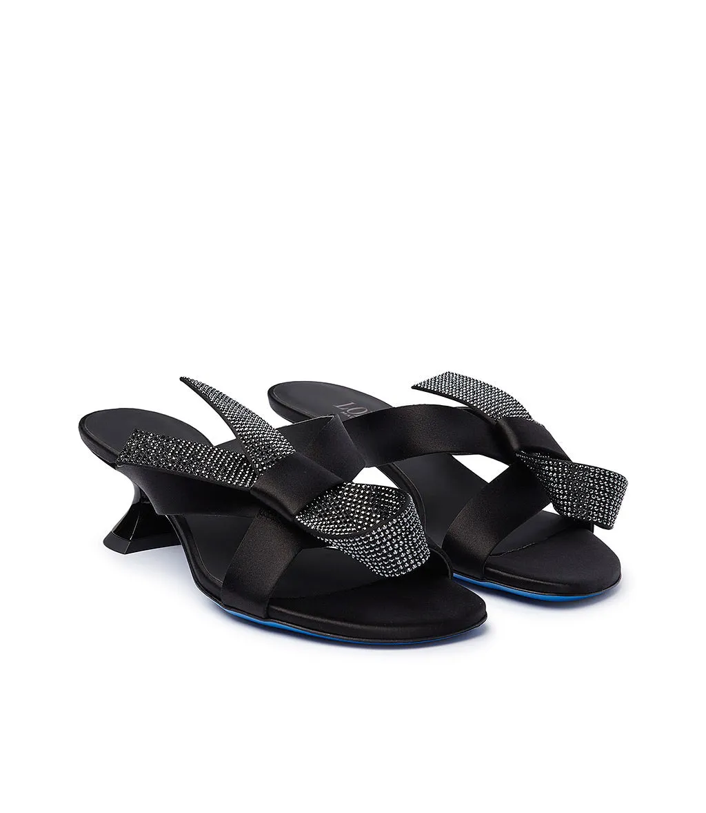 Glittery black silk sandals.