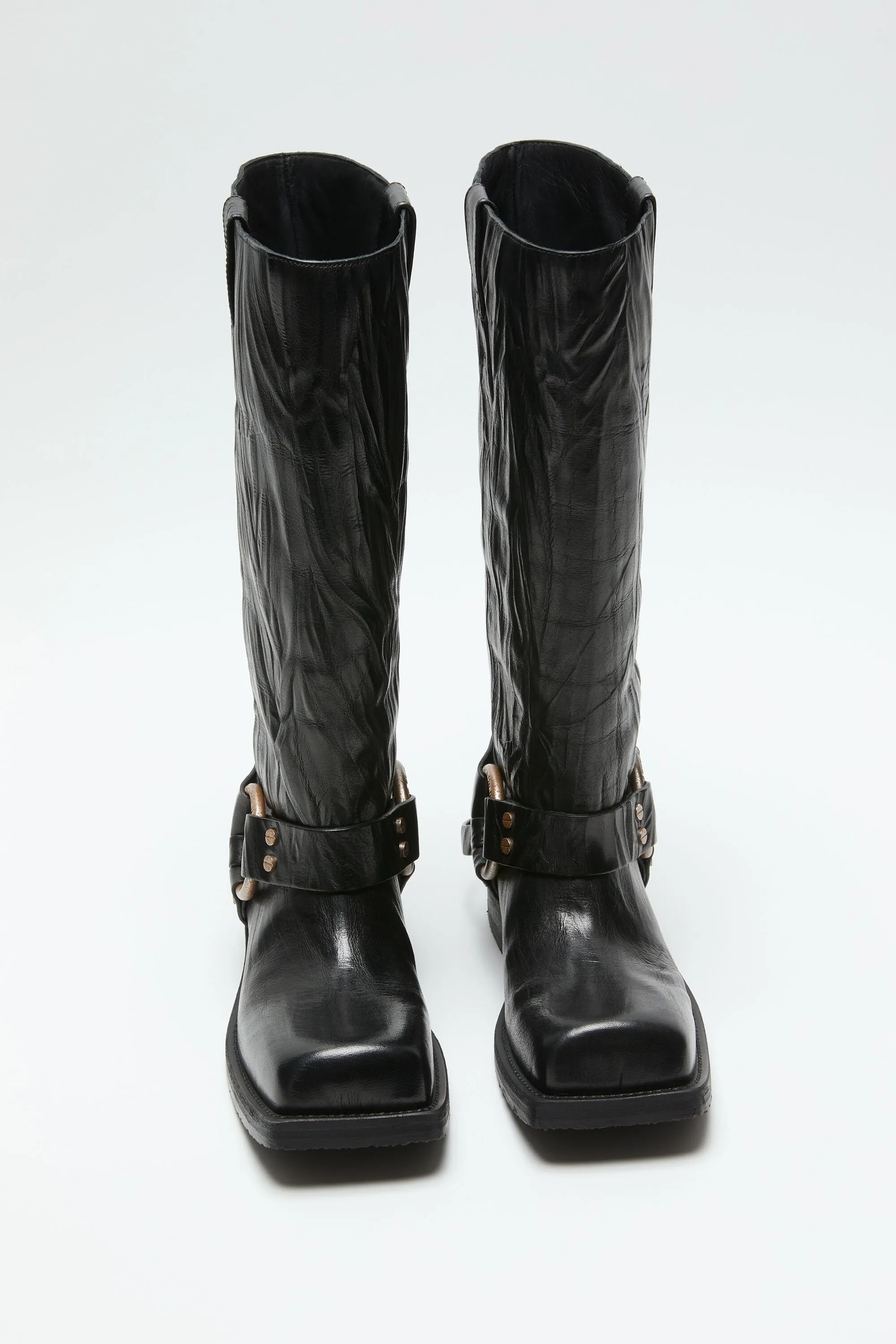 Buckled leather boots