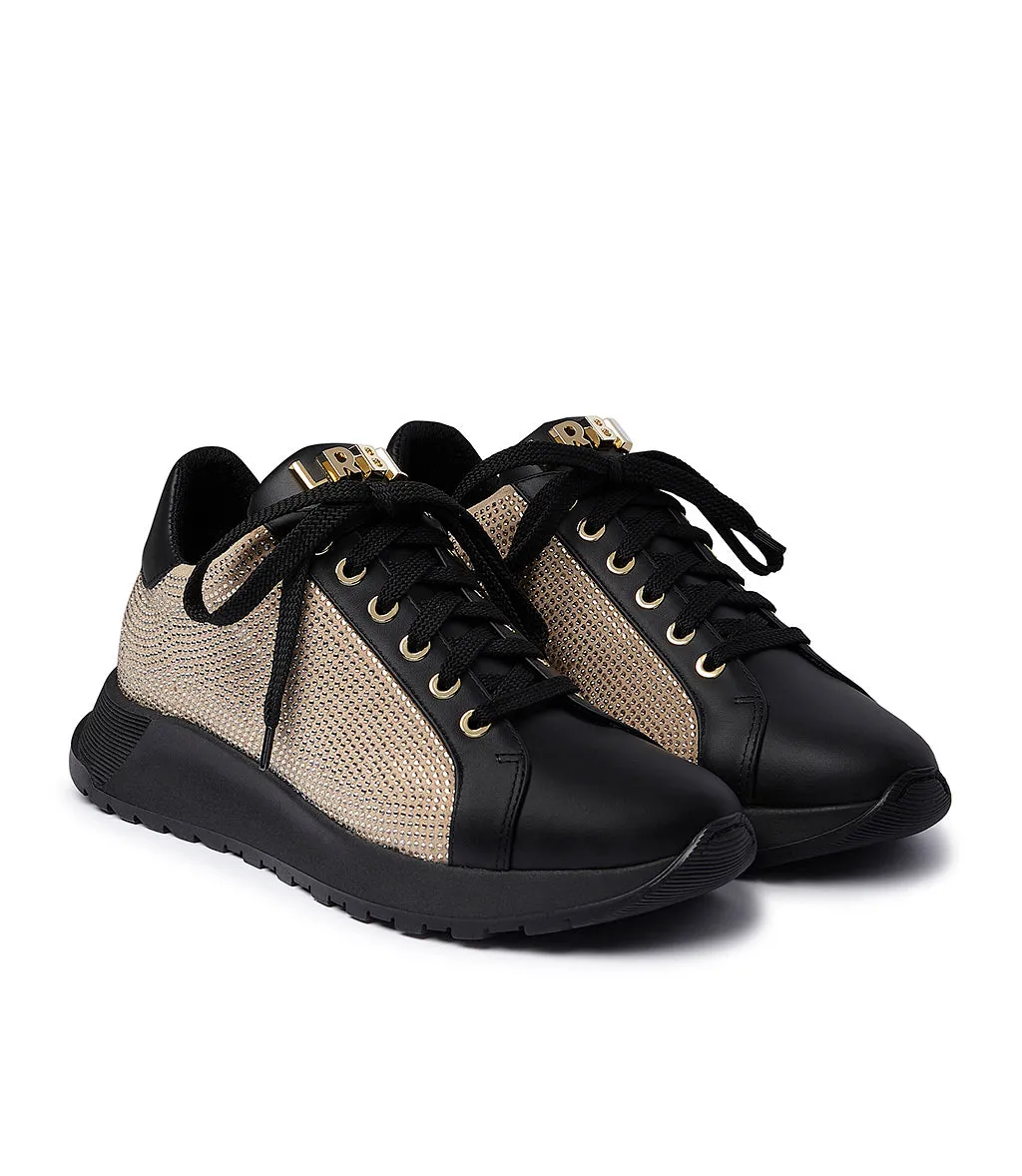 Studded rhinestone black leather and beige suede tennis shoes.